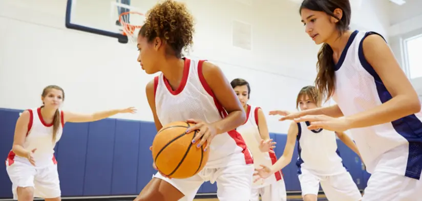 Girls playing basketball