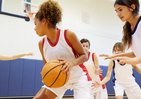 Girls playing basketball