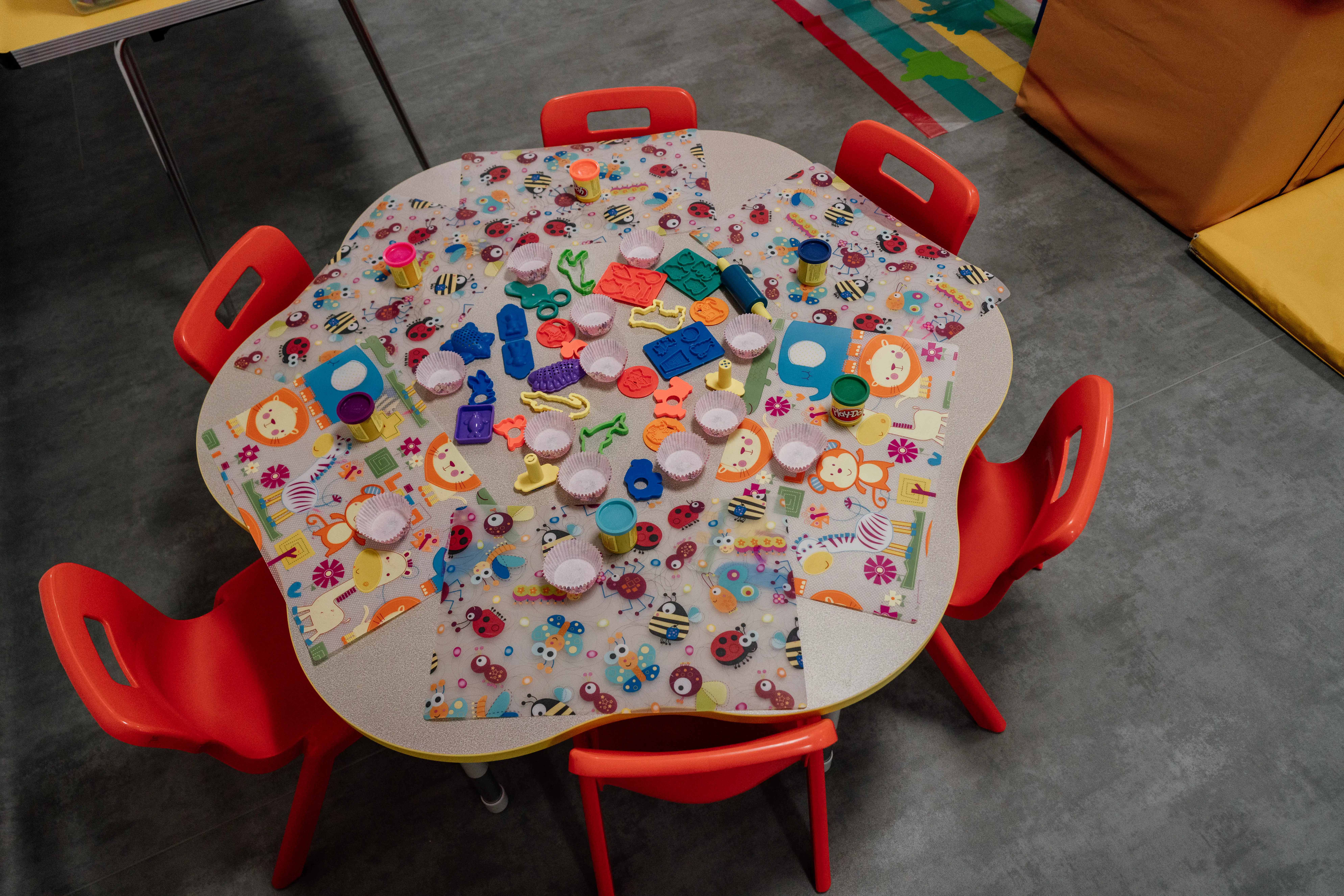 Small round table laid out for craft activity