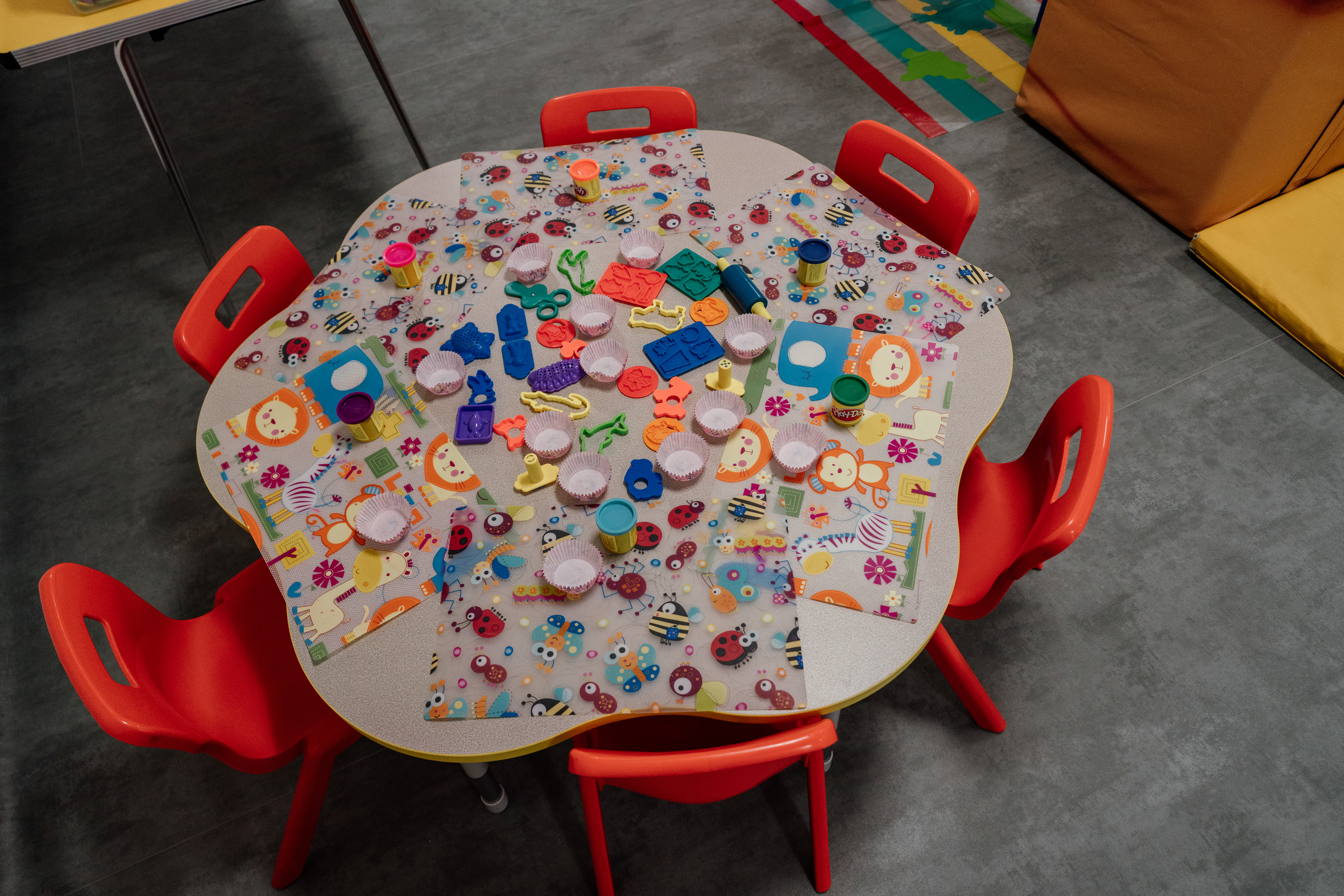 Small round table laid out for craft activity preview