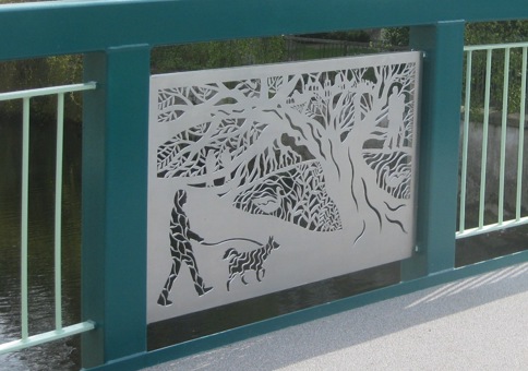Panel in bridge showing scene of people in a park including a dog walker